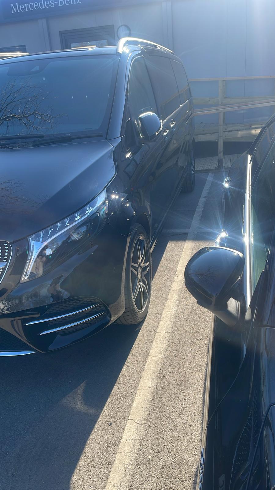 Side and front view of Vectura's black V-Class