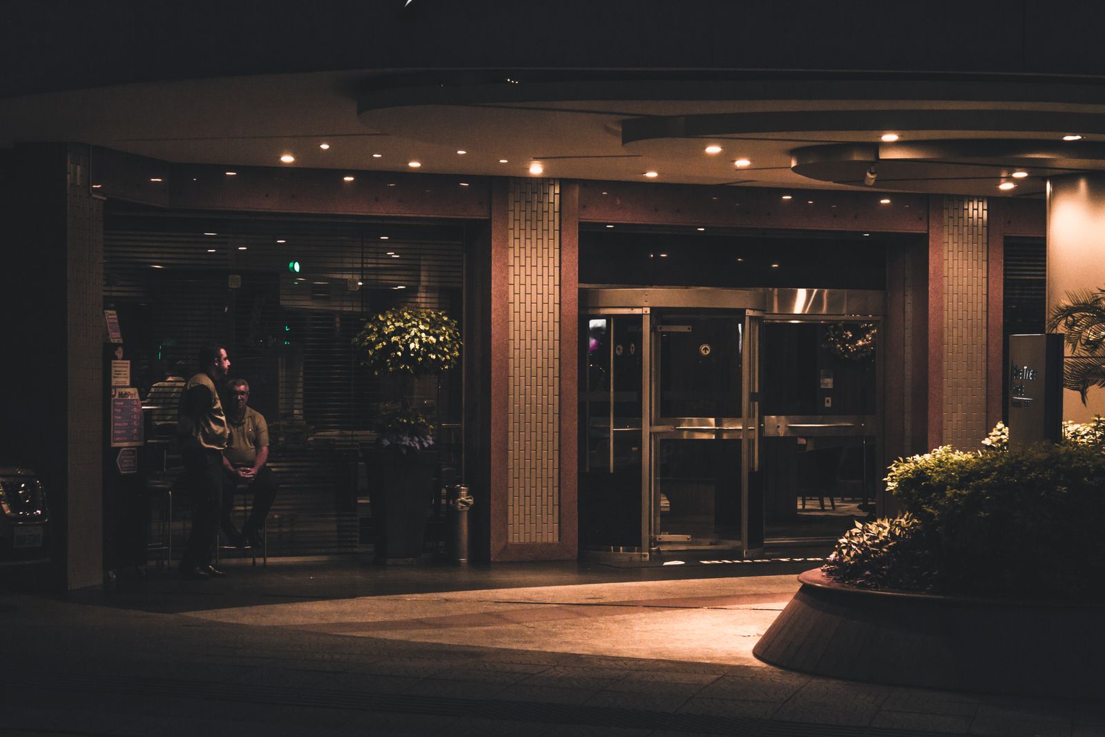 Representative view of an elegant hotel entrance at night