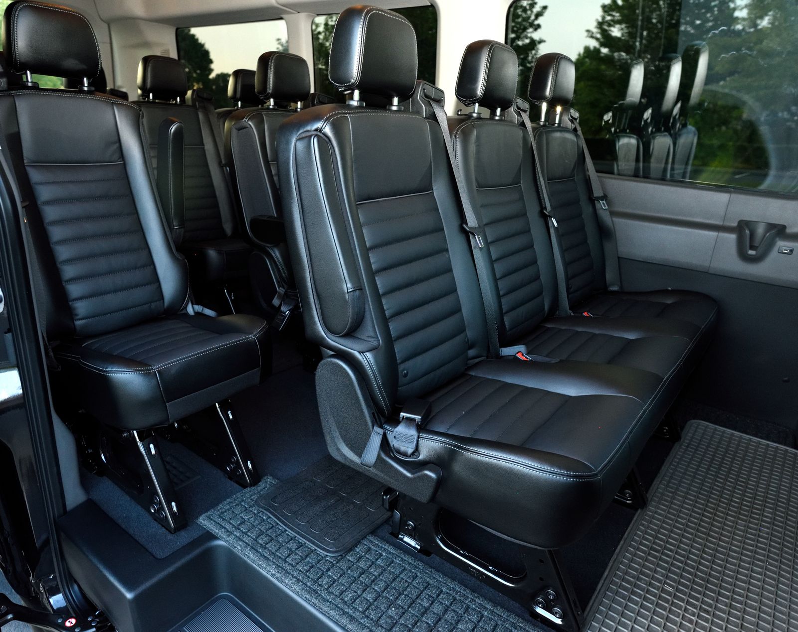 Representative black leather passenger van interior